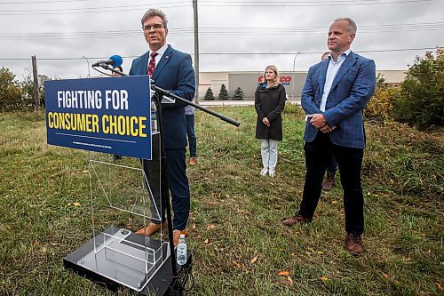 JOHN WOODS / WINNIPEG FREE PRESS
PC candidates Kevin Klein and Rick Shone with supporters announced that their party will bring in the sale of liquor in grocery stores as they gathered in a field across from Kenaston Common shopping area in Winnipeg Sunday, September  24, 2023. 

Reporter: kitching