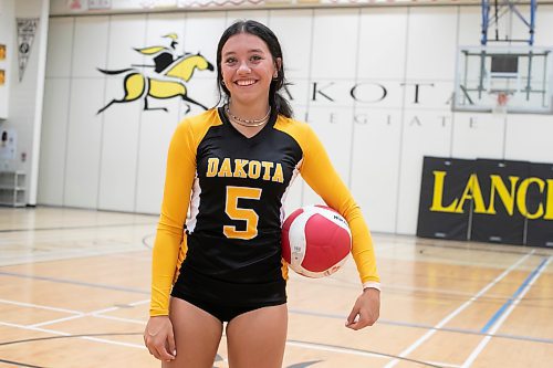 BROOK JONES / WINNIPEG FREE PRESS
Dakota Collegiate Lancers athlete Payton Cvetkovic holds a volleyball while inside the school's gym in Winnipeg, Man., Tuesday, Sept. 26, 2023. The Grade 11 student has played on 11 school sports for the Lancers, such as cross country, track &amp; field, lacrosse, volleyball, basketball, soccer and rugby. 