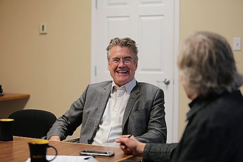 Manitoba Liberal Leader Dougald Lamont shares a laugh with Matt Goerzen, managing editor at the Sun in Brandon on Tuesday. (Michele McDougall/The Brandon Sun) 