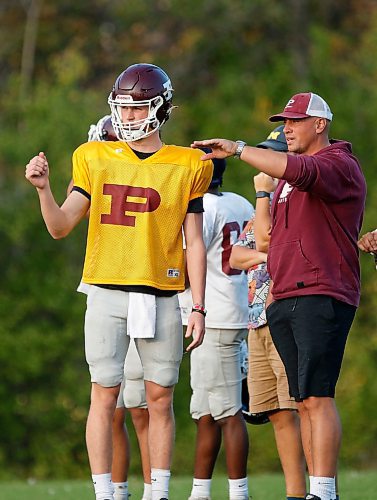 JOHN WOODS / WINNIPEG FREE PRESS
St Paul’s quarterback Cole Anseeuw and quarterback coach Shane Munson are photographed during practice at St Paul’s High School in Winnipeg Tuesday, September 26, 2023.
Reporter: josh
