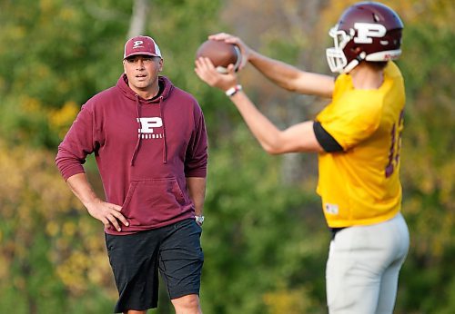 JOHN WOODS / WINNIPEG FREE PRESS
St Paul’s quarterback Cole Anseeuw and quarterback coach Shane Munson are photographed during practice at St Paul’s High School in Winnipeg Tuesday, September 26, 2023. 

Reporter: josh