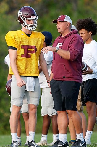 JOHN WOODS / WINNIPEG FREE PRESS
St Paul’s quarterback Cole Anseeuw and quarterback coach Shane Munson are photographed during practice at St Paul’s High School in Winnipeg Tuesday, September 26, 2023. 

Reporter: josh