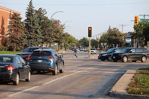MIKE DEAL / WINNIPEG FREE PRESS
Pedestrians cross St. Mary’s Road at Fermor Avenue Wednesday morning. 
A pedestrian was killed in a collision at the intersection of St. Mary’s Road and Fermor Avenue on Tuesday night, police told multiple news organizations Wednesday morning.
230927 - Wednesday, September 27, 2023