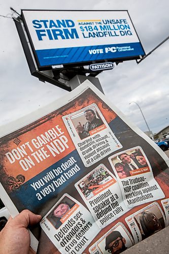 Manitoba provincial Progressive Conservative (PC) party advertising appeared in the Winnipeg Free Press and on city billboards in Winnipeg, Wednesday, Sept. 27, 2023. THE CANADIAN PRESS/John Woods