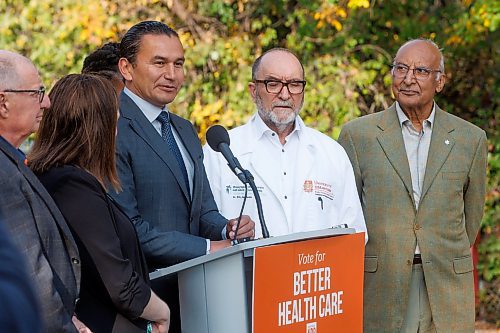 MIKE DEAL / WINNIPEG FREE PRESS
Manitoba NDP leader Web Kinew along with several well known doctors and health leaders announced during a campaign stop near the entrance to the Niakwa Country Club Wednesday morning that his party is committed &#x201c;to fix Manitoba health care by listening to frontline health leaders and changing the culture within health care in Manitoba.&#x201d; 
230927 - Wednesday, September 27, 2023.