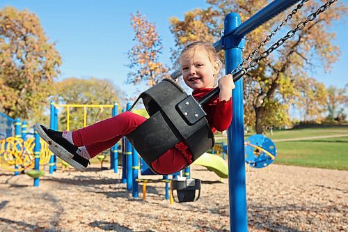 27092023
Three-year-old Amelia Peech plays on the swings at Rideau Park on a sunny Wednesday morning. 
(Tim Smith/The Brandon Sun)