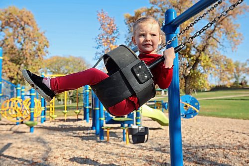 27092023
Three-year-old Amelia Peech plays on the swings at Rideau Park on a sunny Wednesday morning. 
(Tim Smith/The Brandon Sun)