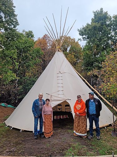 (From left) Landowner Gordon Beddome and his partner Midge Stace and Wendy and Ken Norquay stand outside a teepee erected at Wabano Aki, the new name for a 305-hectare area of land that is also known as Waggle Springs, just south of Shilo on Thursday afternoon. (Miranda Leybourne/The Brandon Sun)