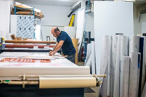 MIKAELA MACKENZIE / WINNIPEG FREE PRESS

Don Gaye, owner of The Sign Source, cuts out signs (destined for Boo in the Zoo) in his shop on Thursday, Sept. 28, 2023. For Maggie story.
Winnipeg Free Press 2023.