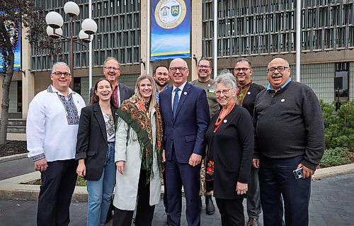 RUTH BONNEVILLE / WINNIPEG FREE PRESS
LOCAL STDUP - Ukraine support
Mayor Scott Gillingham marks the 50th anniversary of Winnipegճ sister city relationship with Lviv, Ukraine and the city's ongoing support, at presser Thursday.
Mayor Scott Gillingham takes a group photo with Joanne Lewandoski, President Ukrainian Canadian Congress - Manitoba (his left) and Mike Ruta, Co-Chair Lviv Sister City Advisory Committee (second from left, rear) along with committee members in front of City Hall after announcement Thursday.
Sept 28th, 2023
