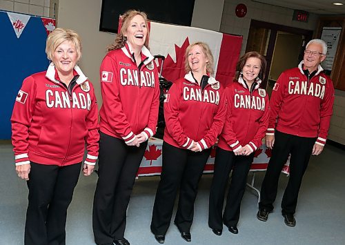 Brandon Sun From left: Lois Fowler, Maureen Bonar, Cathy Gauthier and Allyson Stewart along with coach Brian Fowler make their entrance to the Brandon Curling Club lounge Thursday evening during a ceremony to send the team off to Sochi Russia to compete in the world senior women's curling championship. (Colin Corneau/Brandon Sun)