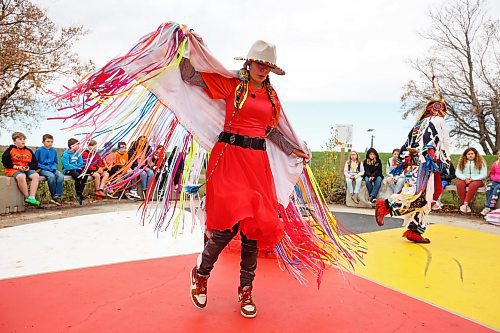 Dancers Alicia Trout of Cross Lake First Nation and Sam Jackson of Sioux Valley Dakota Nation demonstrate powwow dances for students during a third day of educational programming for Westman students at Truth and Reconciliation Week 2023 at the Riverbank Discovery Centre on Friday. See story on Page A2. (Tim Smith/The Brandon Sun)