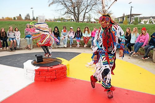 29092022
Dancers Sam Jackson (foreground) of Sioux Valley Dakota Nation and Alicia Trout of Cross Lake First Nation demonstrate powwow dances for students during a third day of educational programming for westman students at Truth and Reconciliation Week 2023 at the Riverbank Discovery Centre on Friday. (Tim Smith/The Brandon Sun)