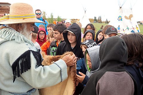 26092022
Trapper Grant Armstrong show students from Tanners Crossing School a variety of furs during a third day of educational programming for westman students at Truth and Reconciliation Week 2023 at the Riverbank Discovery Centre on Friday. (Tim Smith/The Brandon Sun)