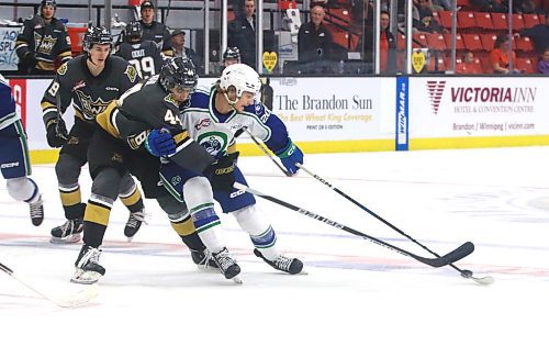 Swift Current Broncos forward Braeden Lewis of Virden (20) skates across the Brandon Wheat Kings zone with the puck with defenders Andrei Maliavan (44) and Carter Klippenstein (19) in hot pursuit during Western Hockey League action at Westoba Place on Saturday. (Perry Bergson/The Brandon Sun)
Sept. 30, 2023