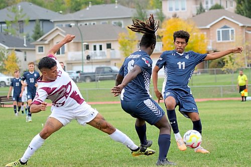 ACC's Enrique Zepeda, left, challenges Johannes Barnes (6) and Isaac Aman of Providence for the ball during their Manitoba Colleges Athletic Conference men's soccer game at the Sportsplex on Sunday. (Thomas Friesen/The Brandon Sun)