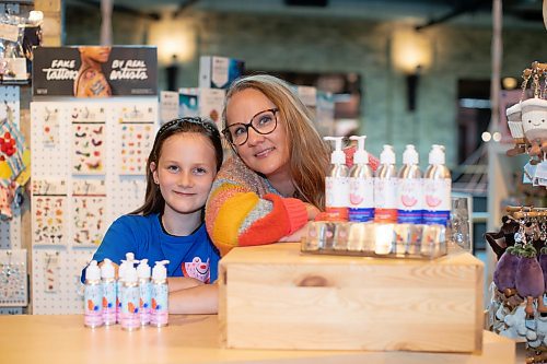 BROOK JONES / WINNIPEG FREE PRESS
Alisha Talbot (right), who is the founder of Lil Lippy, showcases her vegan kids' skincare brand of products at the Forks Trading Company inside The Forks Market in Winnipeg, Man., Sunday, Oct. 1, 2023. The makeup artist was inspired to create the skincare products because of her daughter Lillian Fuller. Talbot is gearing up for her first Christmas holiday season selling Lil Lippy, which includes skincare lotions and lip balms.