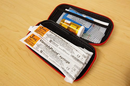 MIKE DEAL / WINNIPEG FREE PRESS
A Naloxone kit that includes four doses, vanish point needles, gloves, a face shield for CPR purposes, and an information card.
220623 - Thursday, June 23, 2022.