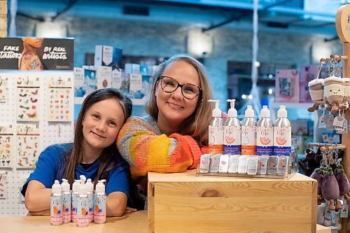 BROOK JONES / WINNIPEG FREE PRESS
Alisha Talbot (right), who is the founder of Lil Lippy, showcases her vegan kids' skincare brand of products at the Forks Trading Company inside The Forks Market in Winnipeg, Man., Sunday, Oct. 1, 2023. The makeup artist was inspired to create the skincare products because of her daughter Lillian Fuller. Talbot is gearing up for her first Christmas holiday season selling Lil Lippy, which includes skincare lotions and lip balms.