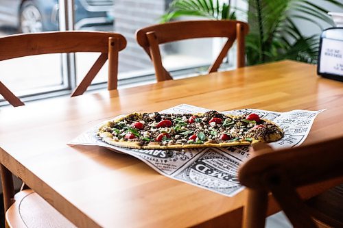 MIKAELA MACKENZIE / WINNIPEG FREE PRESS

The thyme and feta flatbread at Winnibakes, a new Middle Eastern Levantine bakery in Lindenwoods, on Monday, Oct. 2, 2023. For Eva story.
Winnipeg Free Press 2023.