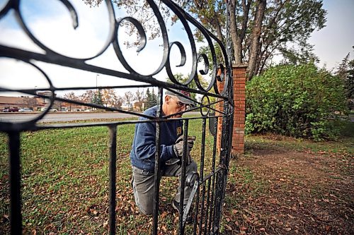 02102023
Bob Patryluk with Royal Canadian Legion Branch 3 works on fixing the Veterans Cemetery gate at the Brandon Cemetery on Monday afternoon. Patryluk and other legion members have been repairing and sprucing up the gate and sign, that were installed in 1962. 
(Tim Smith/The Brandon Sun)
