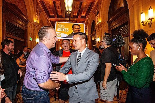 MIKAELA MACKENZIE / WINNIPEG FREE PRESS

Candidate Mike Moyes greets supporters at the NDP party headquarters at the Fort Garry Hotel on Tuesday, Oct. 3, 2023. For election story.
Winnipeg Free Press 2023.