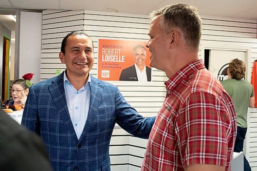BROOK JONES / WINNIPEG FREE PRESS
Manitoba NDP Party Leader Wab Kinew (left) visits with the NDP candidate for St. Boniface Robert Loiselle on election day in Manitoba at his campaign office in Winnipeg, Man., Tuesday, Oct. 3, 2023. Manitobans are voting in the Manitoba Provincial Election Tuesday, Oct. 3, 2023.