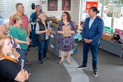 BROOK JONES / WINNIPEG FREE PRESS
Manitoba NDP Party Leader Wab Kinew (far right) visits with NDP candidate for St. Boniface Robert Loiselle and his campaign team on election day in Manitoba at his campaign office in Winnipeg, Man., Tuesday, Oct. 3, 2023. Manitobans are voting in the Manitoba Provincial Election Tuesday, Oct. 3, 2023.
