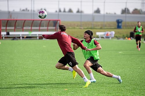 BROOK JONES / WINNIPEG FREE PRESS
Valour FC attacker Matteo de Brienne (left) focusing on the soccer ball as he fights for the ball against one of his teammates and defender Eskander Mzoughi during the team's practice at Ralph Cantafio Soccer Complex in Winnipeg, Man., Tuesday, Oct. 3, 2023. Valour FC takes on HFX Wanderers FC at IG Field in Winnipeg, Man., Friday, Oct. 6, 2023.