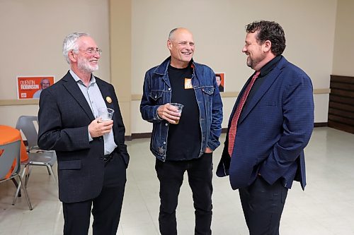 03102023
Brandon West NDP Candidate Quentin Robinson (L) and Brandon East NDP candidate Glen Simard (R) visit with former Brandon East NDP MLA Drew Caldwell at their campaign party at the Royal Canadian Legion Branch 3 on Victoria Avenue East while awaiting poll results on Tuesday evening.
(Tim Smith/The Brandon Sun)