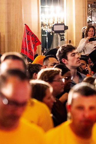 MIKAELA MACKENZIE / WINNIPEG FREE PRESS

A search the landfill banner in the crowd at the NDP party headquarters at the Fort Garry Hotel on Tuesday, Oct. 3, 2023. For election story.
Winnipeg Free Press 2023.