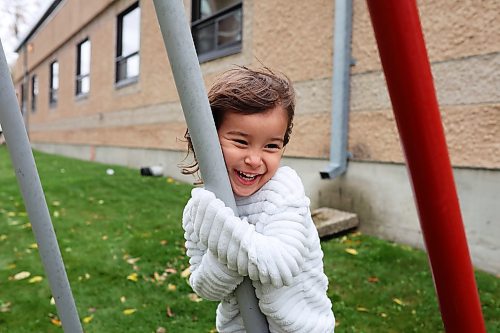 05102023
Four-year-old Ava Armstrong plays with her siblings at the metal tipi on 9th Street in Brandon on a cool and grey Thursday.   (Tim Smith/The Brandon Sun) 