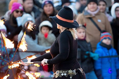 BROOK JONES / WINNIPEG FREE PRESS
Boo at the Zoo at the Assiniboine Park Zoo in Winnipeg Man., features a number of performers as well as plenty of Halloween fun. Boo at the Zoo run Oct. 6 to . 29. Pictured: Fire performer Laura JC from Street Circus spins a fire parasol as she entertains the crowd during the opening night of Boo at the Zoo Friday, Oct. 6, 2023.