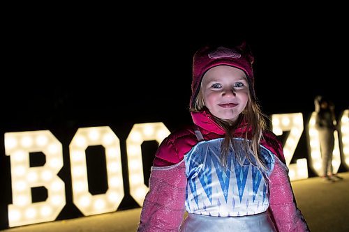 BROOK JONES / WINNIPEG FREE PRESS
Boo at the Zoo at the Assiniboine Park Zoo in Winnipeg Man., features a number of performers as well as plenty of Halloween fun. Boo at the Zoo run Oct. 6 to . 29. Pictured: Five-year-old Elena Greene stands in front of a large light up sign, which was popular for selfies on opening night of Boo at the Zoo Friday, Oct. 6, 2023. Greene was seen having her photo taken by her parents with her eight-year-old brother Eli a moment earlier.