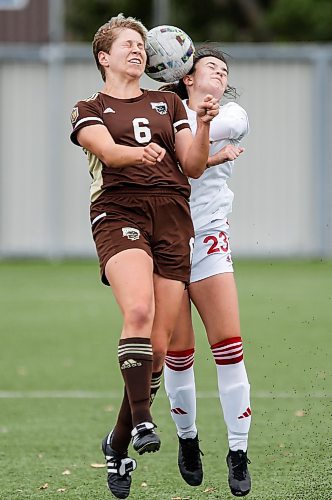 JOHN WOODS / WINNIPEG FREE PRESS
University of Manitoba Bisons&#x2019; Lulu Bordeaux (6) defends against the University of Winnipeg Wesmen&#x2019;s Chloe Zarrillo (23) at the Ralph Cantafio Complex Sunday, October 8, 2023.

Reporter: ?