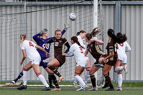 JOHN WOODS / WINNIPEG FREE PRESS
University of Manitoba Bisons&#x2019; Evelyn Lekivetz&#x2019;s (3) header goes in against the University of Winnipeg Wesmen at the Ralph Cantafio Complex Sunday, October 8, 2023.

Reporter: ?