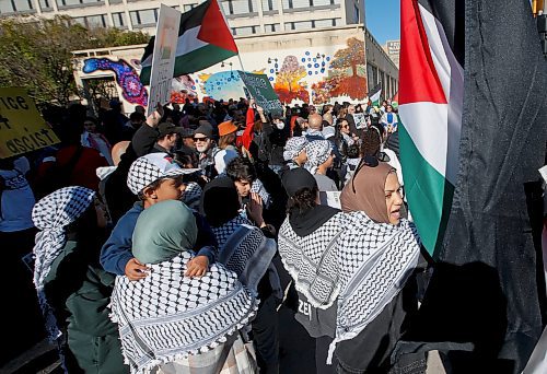 JOHN WOODS / WINNIPEG FREE PRESS
About 150 Palestinian supporters rally outside City Hall and throughout the Exchange District as six Israel supporters gather on the opposite side of Main Street in Winnipeg Monday, October 9, 2023. 

Reporter: searles
