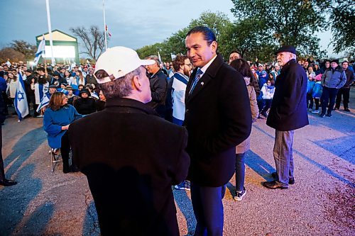 JOHN WOODS / WINNIPEG FREE PRESS
Wab Kinew talks to a supporter of Israel&#x2019;s conflict with Palestine gather at a rally at the Asper Jewish Community Campus in Winnipeg Tuesday, October 10, 2023. 

Reporter: macintosh