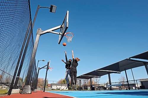 10102023
Victor Aderemi-Fawoye and Jackson Doty shoot hoops together at the Jumpstart Multi Sport Court in Brandon&#x2019;s south end on a beautiful Tuesday afternoon. (Tim Smith/The Brandon Sun)