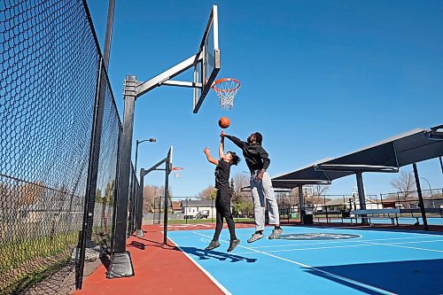 10102023
Jackson Doty and Victor Aderemi-Fawoye shoot hoops together at the Jumpstart Multi Sport Court in Brandon&#x2019;s south end on a beautiful Tuesday afternoon. (Tim Smith/The Brandon Sun)