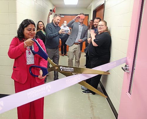 Dr. Mousumi Majumder, Canada Research Chair in Genotoxicology at Brandon University, cuts a ribbon to unveil the BU Breast Cancer Cell and Molecular Research Laboratory at the university on Wednesday. The lab will be run by Majumder. 
(Photos by Tim Smith/The Brandon Sun)
