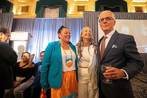 MIKAELA MACKENZIE / WINNIPEG FREE PRESS

Calahoo Stonehouse (left, Albertan MLA), Nahanni Fontaine (NDP candidate), and Nello Altomare (NDP candidate) greet each other minutes after polls close at the NDP party headquarters at the Fort Garry Hotel on Tuesday, Oct. 3, 2023. For election story.
Winnipeg Free Press 2023.