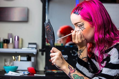 MIKAELA MACKENZIE / WINNIPEG FREE PRESS

Maddy Harms demonstrates how to connect the eyeliner shapes for a spiderweb Halloween make-up look on Wednesday, Oct. 11, 2023. For AV Kitching story.
Winnipeg Free Press 2023.