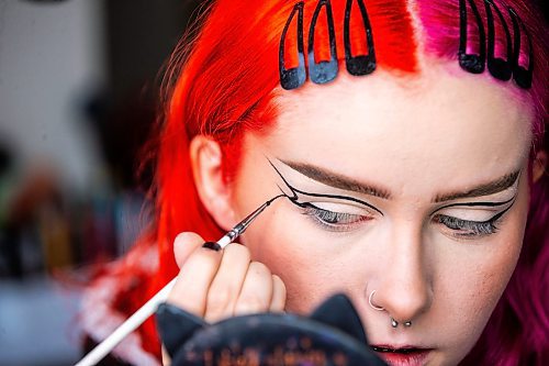 MIKAELA MACKENZIE / WINNIPEG FREE PRESS

Maddy Harms demonstrates how to connect the eyeliner shapes for a spiderweb Halloween make-up look on Wednesday, Oct. 11, 2023. For AV Kitching story.
Winnipeg Free Press 2023.