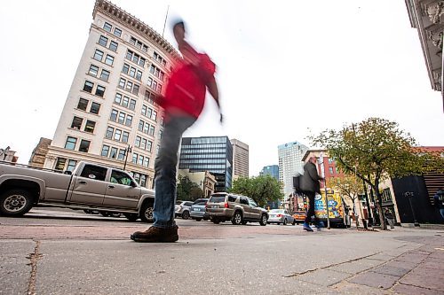 MIKAELA MACKENZIE / WINNIPEG FREE PRESS

People walk downtown on Main Street in Winnipeg on Wednesday, Oct. 11, 2023. For public safety story.
Winnipeg Free Press 2023.