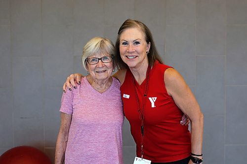 89-year-old Peggy Fleming, fitness enthusiast and Sue Palmer, fitness class supervisor at Brandon's YMCA. (Tim Smith/The Brandon Sun)