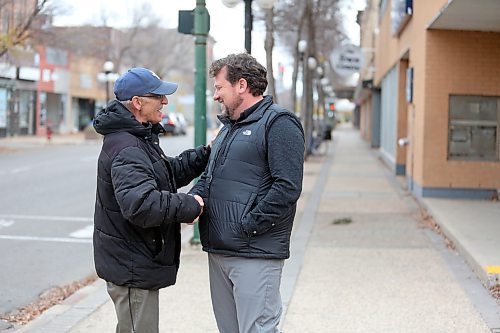 NDP Brandon East MLA elect Glen Simard shakes hands with a supporter on Rosser Avenue a week after his election win on Oct. 3. (Matt Goerzen/The Brandon Sun)