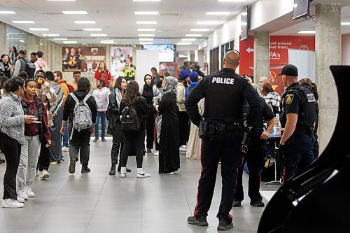 MIKE DEAL / WINNIPEG FREE PRESS
Winnipeg Police officers in University Centre at the UofM Fort Garry campus Friday afternoon, showing an increased presence because of the Hamas-Israel conflict.
231013 - Friday, October 13, 2023.