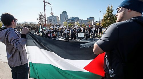 JOHN WOODS / WINNIPEG FREE PRESS
People gather to protest the war with Israel at the Human Rights Museum in Winnipeg Sunday, October 15, 2023. 

Reporter: searle