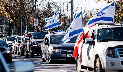 JOHN WOODS / WINNIPEG FREE PRESS
Israel supporters held a car rally and gathered to support the war with Palestine at the Manitoba Legislature in Winnipeg Sunday, October 15, 2023. 

Reporter: searle